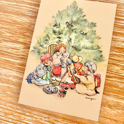 Three kids opening gifts - Krimgen postcard