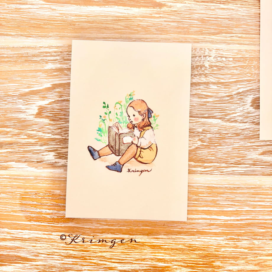 A child sitting and reading - Krimgen postcard