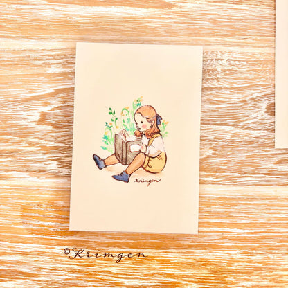 A child sitting and reading - Krimgen postcard