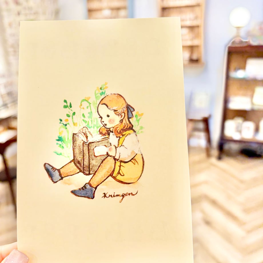 A child sitting and reading - Krimgen postcard