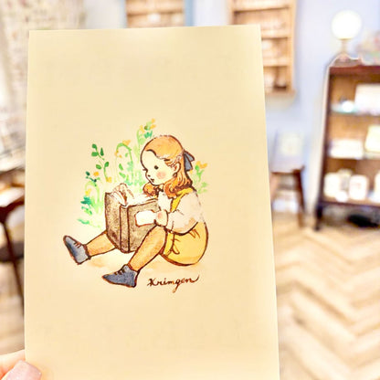 A child sitting and reading - Krimgen postcard